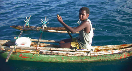 DSCN6402PreteenGirlSellingTomatoesfromDugOut