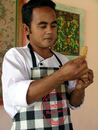 The chef preparing satay appetizers