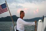 Ingrid at the helm leaving Singapore