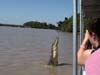09 Tourist photographs jumpin' croc