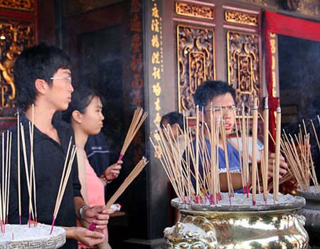 Giving Offerings at the Temple